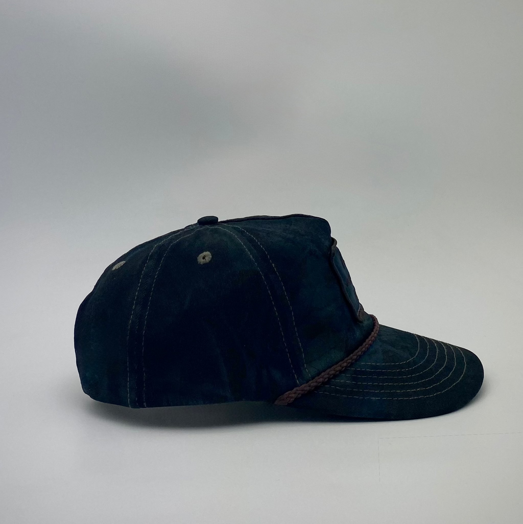 LOOPER Patch Cap V2 Nightfall Camo lifestyle — unique shadowed camo pattern, adjustable snap strap