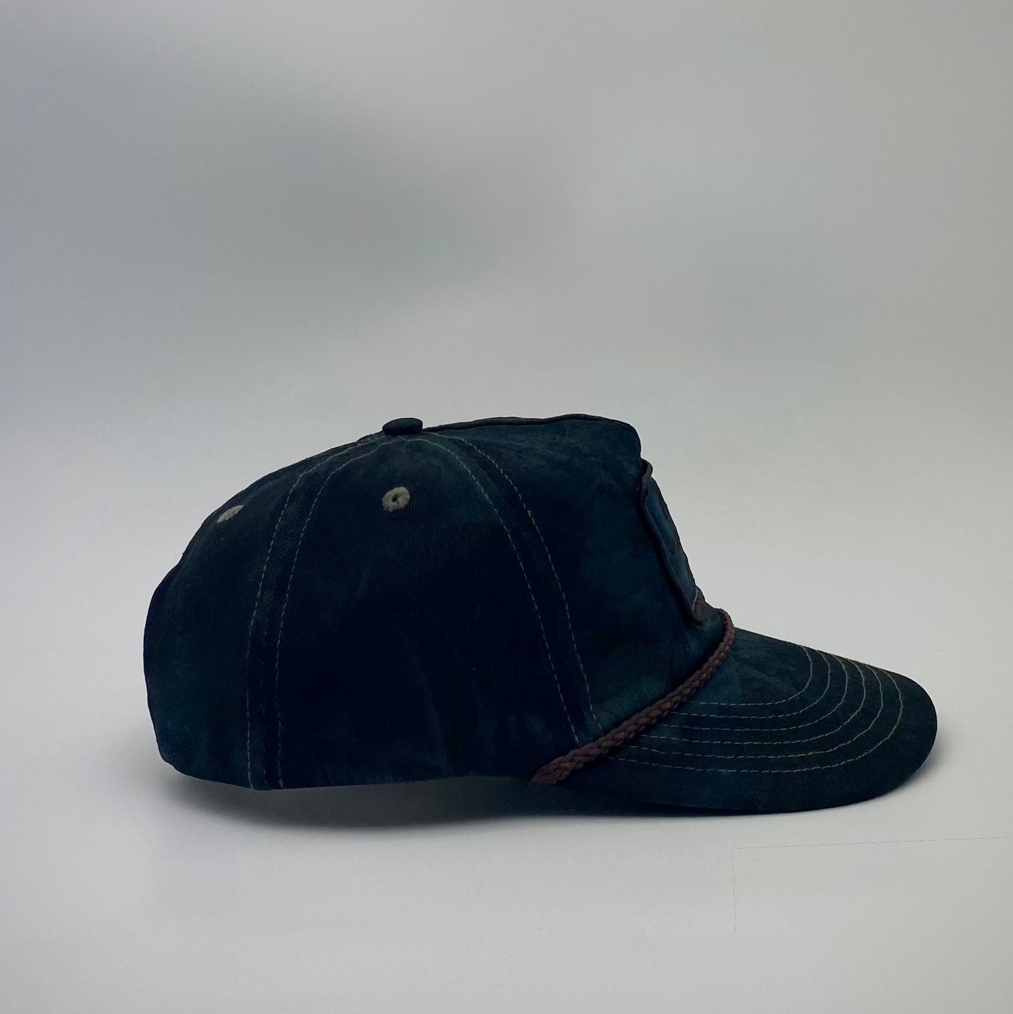 LOOPER Patch Cap V2 Nightfall Camo lifestyle — unique shadowed camo pattern, adjustable snap strap
